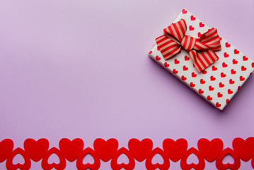 Gift box with beautiful red ribbon