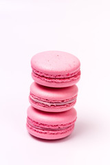 Stack of Pink Macarons on White Background French Dessert Strawberry Macarons Vertical