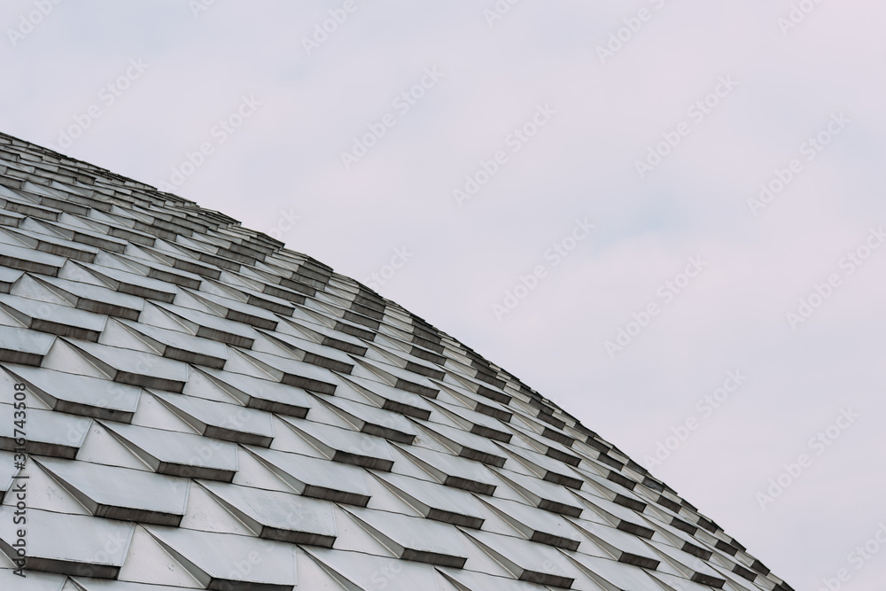 Wall mural low angle view of geometric pattern on roof of building