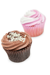 Chocolate and raspberry cupcakes against white background