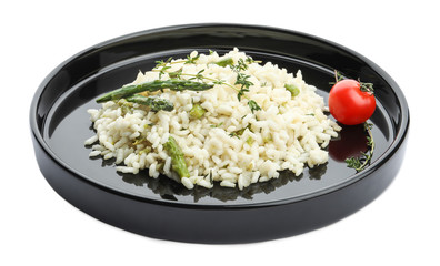 Delicious risotto with asparagus isolated on white