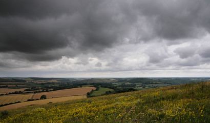 storm over countryside landscape