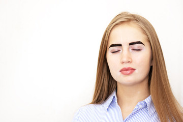 Henna eyebrow tinting. Girl in a beauty salon. Gentle facial skin care. Safe cosmetic procedures. The model is light brown, with light sensitive skin. Skin with pigmentation disorders vitiligo