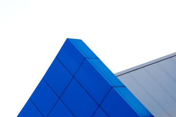 Fototapeta na wymiar fragment of the wall of a modern blue building on a white background