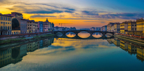Florence, Ponte alla Carraia medieval Bridge landmark on Arno river at sunset. Tuscany, Italy. - obrazy, fototapety, plakaty