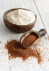Teff flour in a bowl and teff grain with a spoon