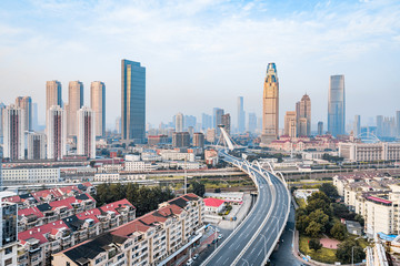 Naklejka na ściany i meble Early morning city scenery of Chifeng Bridge in Tianjin, China