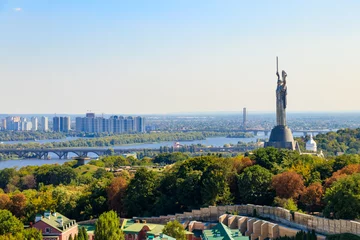Fototapeten View of Motherland Monument and the Dnieper river in Kiev, Ukraine. Kiev cityscape © olyasolodenko
