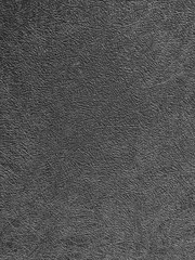 Abstract grey background with chaotic difffernet lines. Image of dark pattern of a metal pattern extruded on a sheet of unpredictable straight lines and arcs.