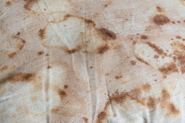 Close-up old dirty pillow with saliva stain and fungus cause of illness