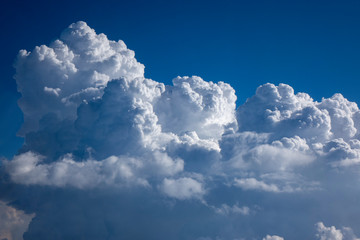 Naklejka na ściany i meble Clouds frame as a creative blue sky background.