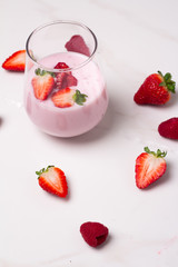 glass with yogurt and fresh berries