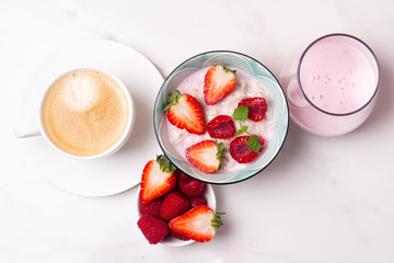porridge, coffee and fresh berries top view