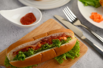 Appetizers with hotdog and bacon in bread