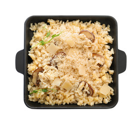 Delicious risotto with cheese and mushrooms isolated on white, top view