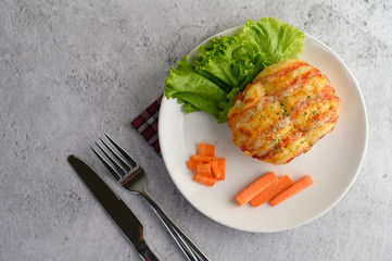 appetizing of sausage bread roll in white dish