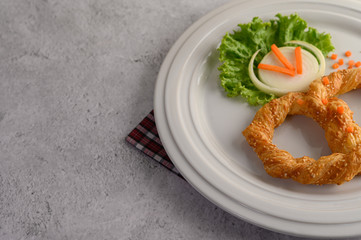 Appetizers of Pretzel on white dish