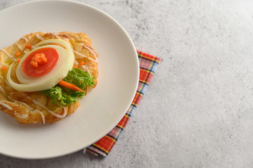 Appetizing with Almond twist bread on white dish