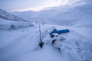 Man climber falling ill on top of hill