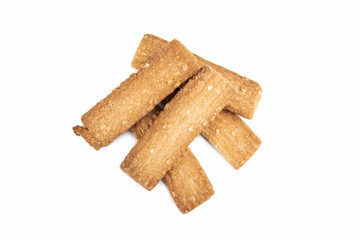Biscuits with sesame seeds on a white background
