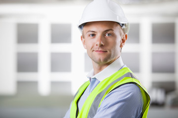 Portrait of confident young Caucasian architect smiling