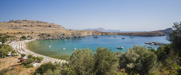 Naklejka premium Vliha Bay and Beach of Lindos, overview of from the Acropolis. Lindos, Rhodes, Greece