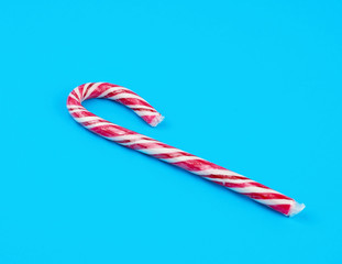 red-white candy stick in transparent cellophane