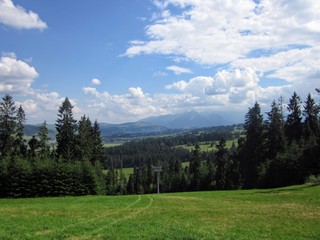 Picturesque landscape - Pieniny mountains, Poland.  Cloudy summer day in mountains.  Dark clouds over green mountain hills