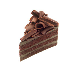 Chocolate cake slice with curl on white background