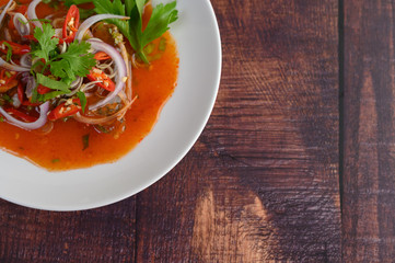 Canned Sardine Salad with tomato sauce in white dish