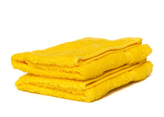 Yellow towels isolated on white with copyspace