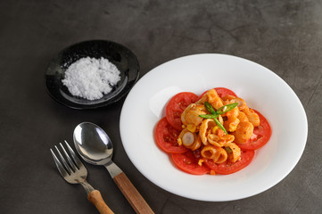 Stir fried macaroni with tomato sauce