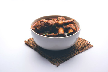 Hyderabadi Mutton Paya, Nehari, nahari or Nihari Masala. served with Naan and rice. selective focus