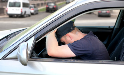 Man fall asleep in the Car