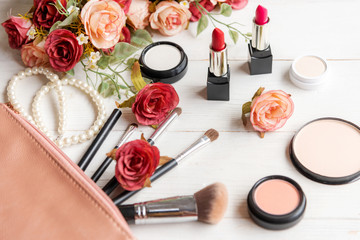 Obraz na płótnie Canvas Makeup beauty cosmetic fashion set background. Cosmetics woman bag product facial, lipstick and items decorative composition flat lay on white background.  Lifestyle fashion Valentine Gift Concept