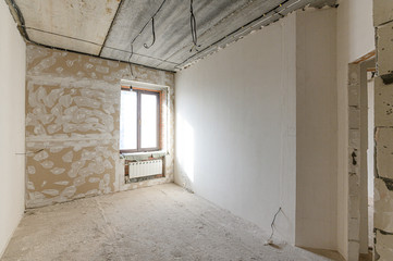 Russia, Moscow- September 10, 2019: interior room apartment rough repair for self-finishing. interior decoration, bare walls of the room, stage of construction