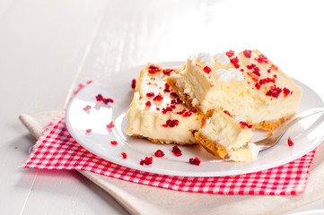 Homemade cheesecake pieces with dried strawberry