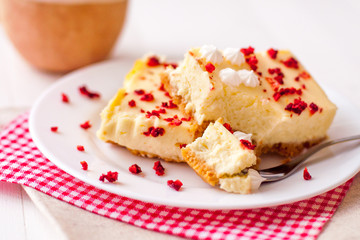 Homemade cheesecake pieces with dried strawberry