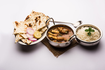 Hyderabadi Mutton Paya, Nehari, nazari or Nihari Masala. served with Naan and rice. selective focus