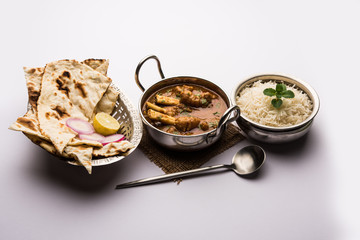 Hyderabadi Mutton Paya, Nehari, nazari or Nihari Masala. served with Naan and rice. selective focus