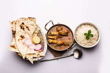 Hyderabadi Mutton Paya, Nehari, nazari or Nihari Masala. served with Naan and rice. selective focus