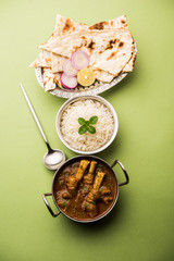 Hyderabadi Mutton Paya, Nehari, nazari or Nihari Masala. served with Naan and rice. selective focus