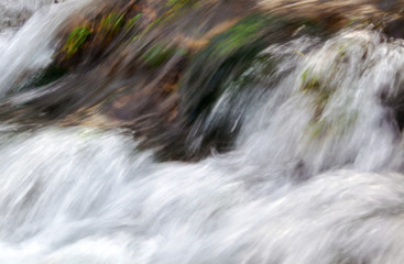 water flowing over rocks