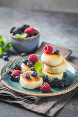 Cottage cheese pancakes with berries. Healthy Breakfast.
