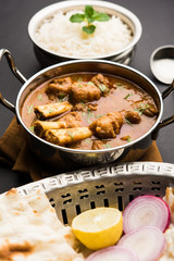 Hyderabadi Mutton Paya, Nehari, nazari or Nihari Masala. served with Naan and rice. selective focus