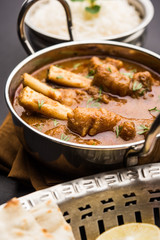 Hyderabadi Mutton Paya, Nehari, nazari or Nihari Masala. served with Naan and rice. selective focus