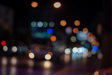 Blurred images of the front of the car on the road at night