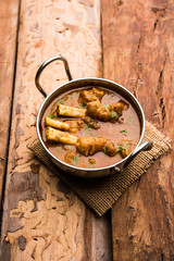 Hyderabadi Mutton Paya, Nehari, nazari or Nihari Masala. served with Naan and rice. selective focus