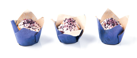 Blueberry muffins with white chocolate in a row isolated on white background