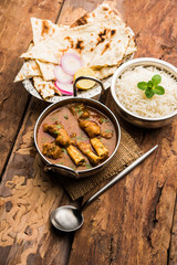 Hyderabadi Mutton Paya, Nehari, nazari or Nihari Masala. served with Naan and rice. selective focus